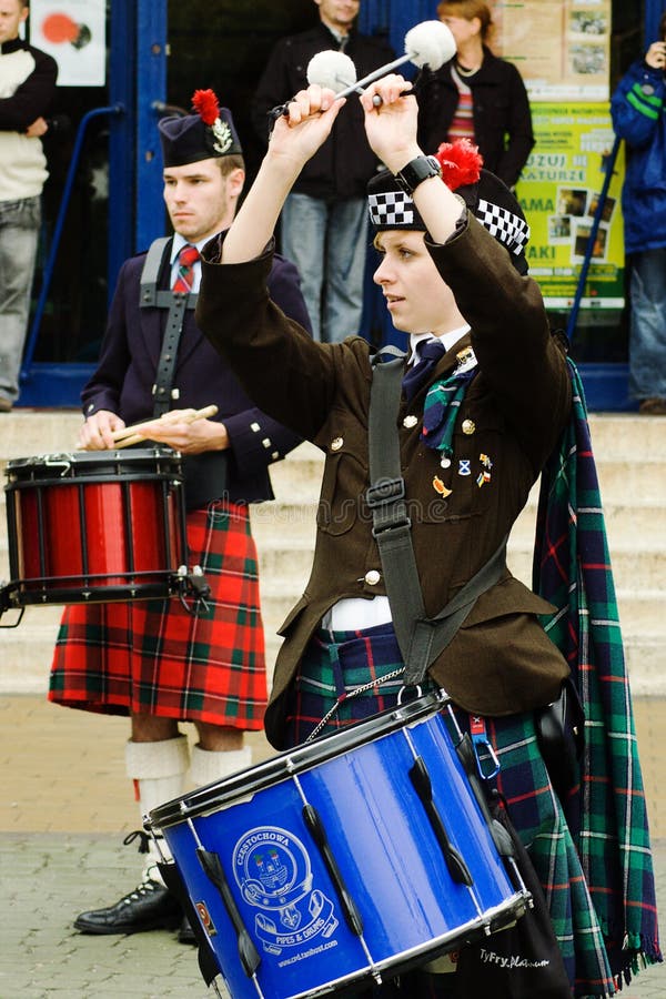 RADZIONKOW - 2009 MAY 30: the show of drums and pipes? scottish music group during military rally cars.30 may 2009 in Radzionkow, Poland. RADZIONKOW - 2009 MAY 30: the show of drums and pipes? scottish music group during military rally cars.30 may 2009 in Radzionkow, Poland