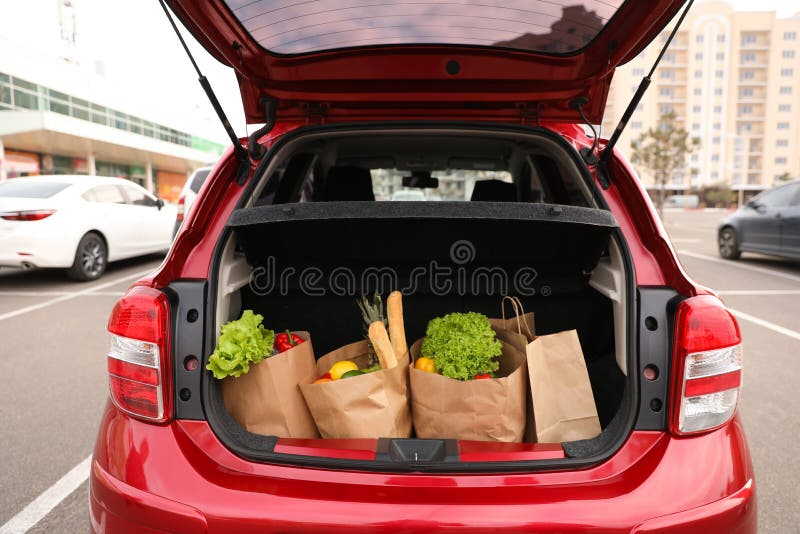 Bags Full of Groceries in Car Trunk Outdoors Stock Image Image of