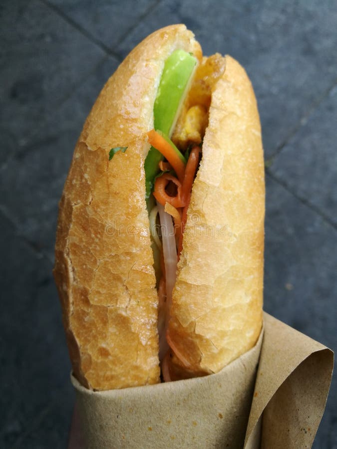 Baguette bread with vegetable and meat filling