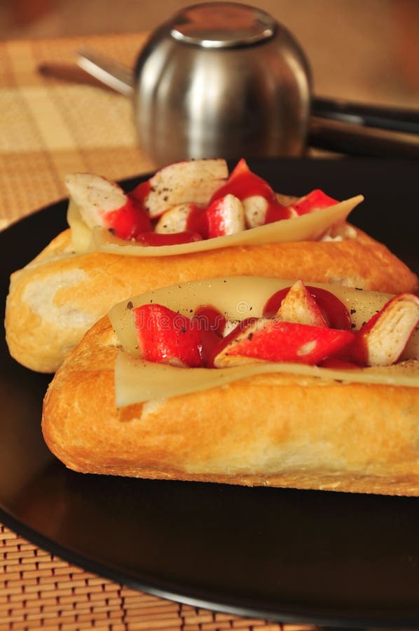 Baguette with crab sticks stock photo. Image of spice 29844266