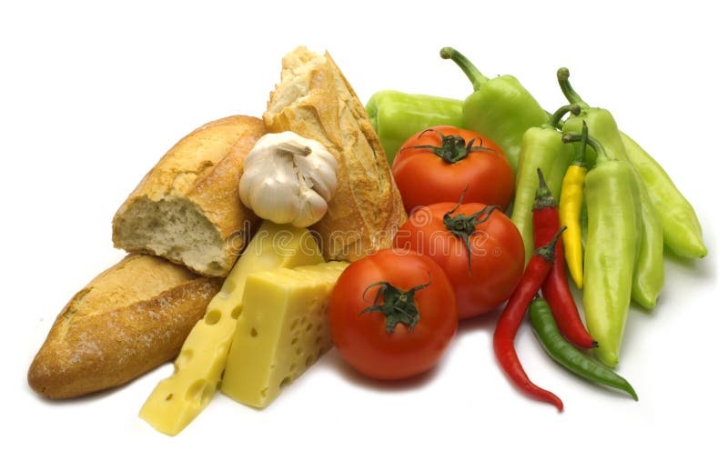 Break baguette and fresh vegetables on white background. Break baguette and fresh vegetables on white background