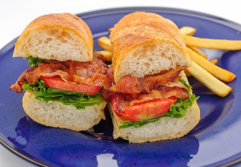 Baguette sandwiches with fried ham stock images
