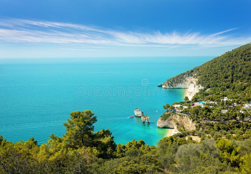 Baia delle Zagare beach, Gargano and Faraglioni Rock formation eroded by waves in Puglia, famous touristic destination stock photography Baia delle Zagare beach, Gargano and Faraglioni Rock formation eroded by waves in Puglia, famous touristic destination stock photography