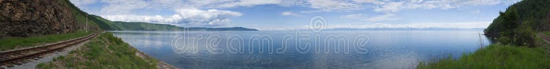 Panoramic photo of lake Baikal with Circum-Baikal Road, the historical part of Trans-Siberian railway. XXXL. Lake Baikal contents about 1/5 of world reserve of sweet water. Panoramic photo of lake Baikal with Circum-Baikal Road, the historical part of Trans-Siberian railway. XXXL. Lake Baikal contents about 1/5 of world reserve of sweet water.