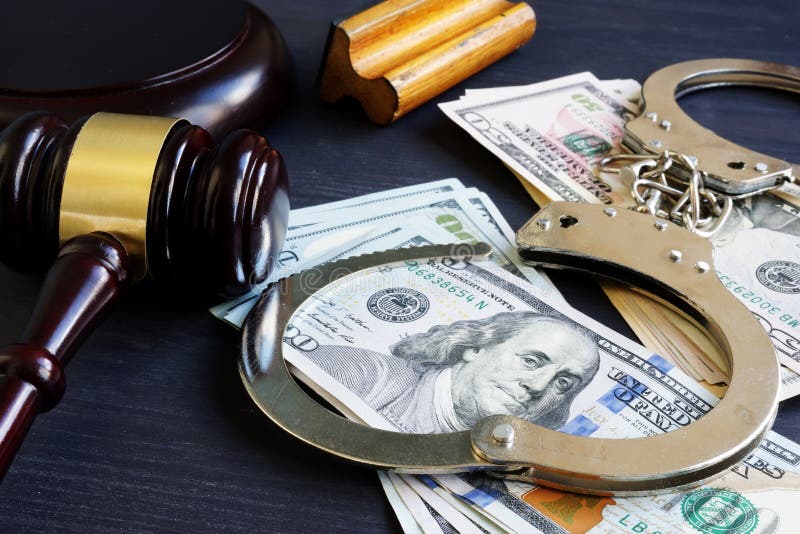 Bail bond. Corruption. Gavel, handcuffs and money.