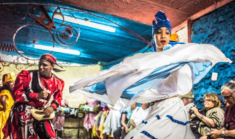 Developing from the slave trade in Cuba, Santeria is an Afro-Caribbean religion based on Yoruba beliefs and traditions, with some Roman Catholic elements added. These dancers share their folkloric traditions and rumba dance with visitors attending an Afro-Cuban Religion Tour of Old Havana. Developing from the slave trade in Cuba, Santeria is an Afro-Caribbean religion based on Yoruba beliefs and traditions, with some Roman Catholic elements added. These dancers share their folkloric traditions and rumba dance with visitors attending an Afro-Cuban Religion Tour of Old Havana.