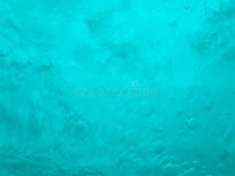 Baisses d'eau bouillante Couleurs sous-marines naturelles attrayantes de bleu de turquoise Belle texture du mouvement des vagues image libre de droits Baisses d'eau bouillante Couleurs sous-marines naturelles attrayantes de bleu de turquoise Belle texture du mouvement des vagues image libre de droits