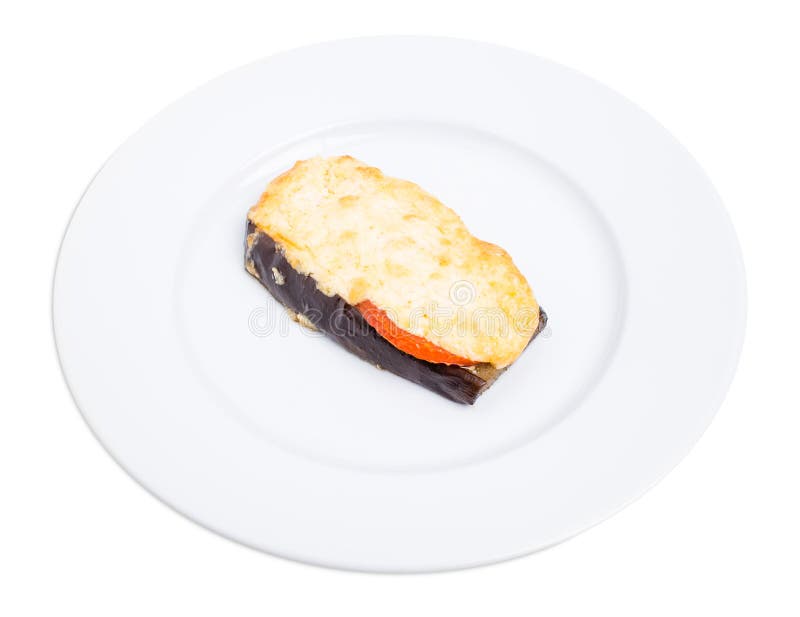 Bakad aubergineskiva med ost och tomater royaltyfria foton Bakad aubergineskiva med ost och tomater royaltyfria foton