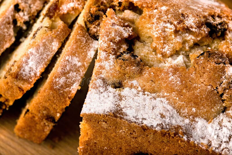 Baked cake and slices with sugar powder. Baked cake and slices with sugar powder