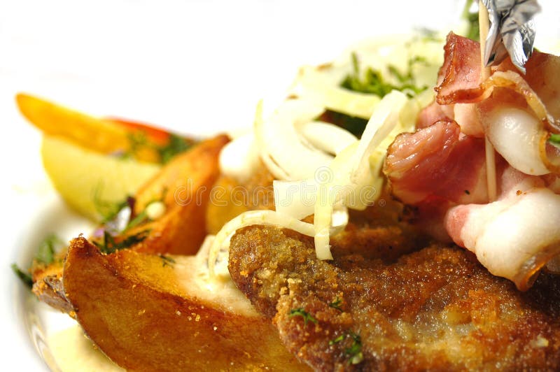 bakade stekte porkpotatisar arkivbilder bakade stekte porkpotatisar arkivbilder