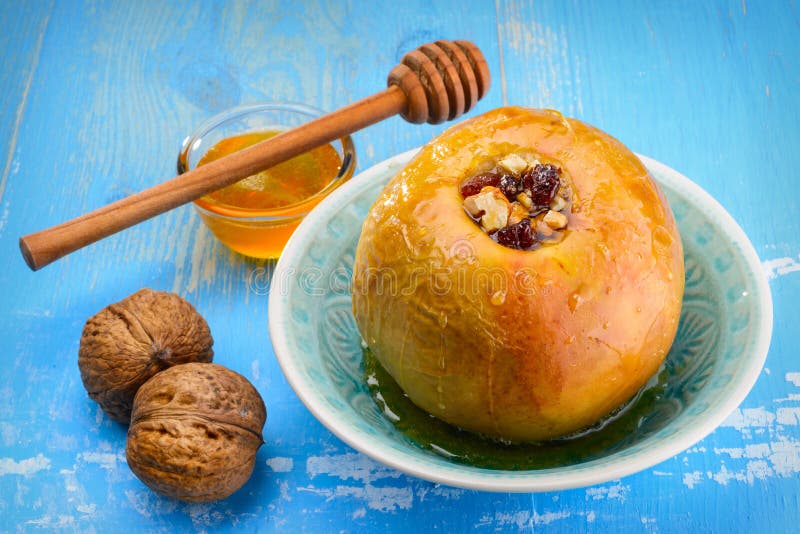 Baked apples with nuts and honey