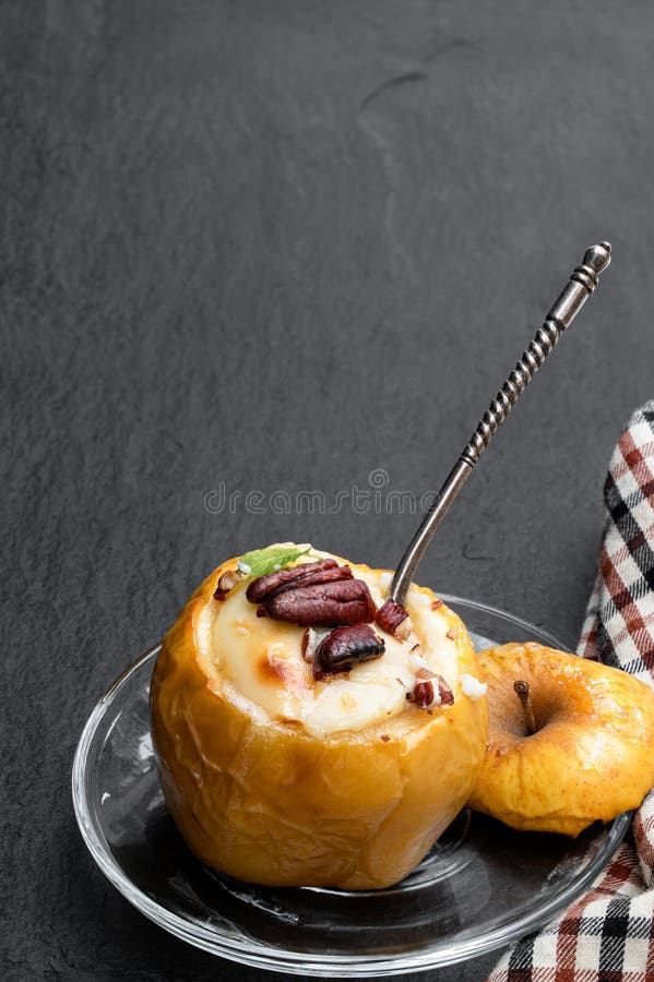 Baked Apples Stuffed with Soft Cheese and Nuts Isolated on White Stock