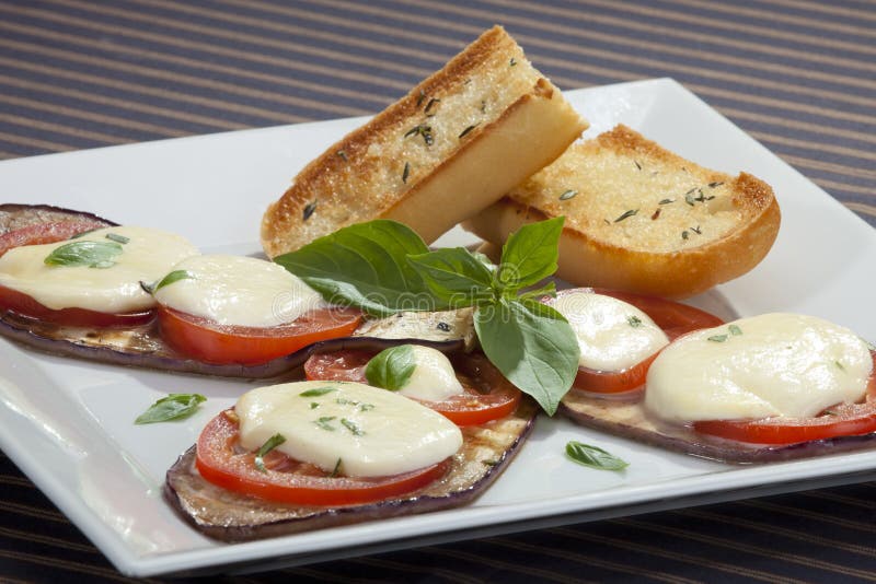 Baked aubergine w tomatoes and mozzarella