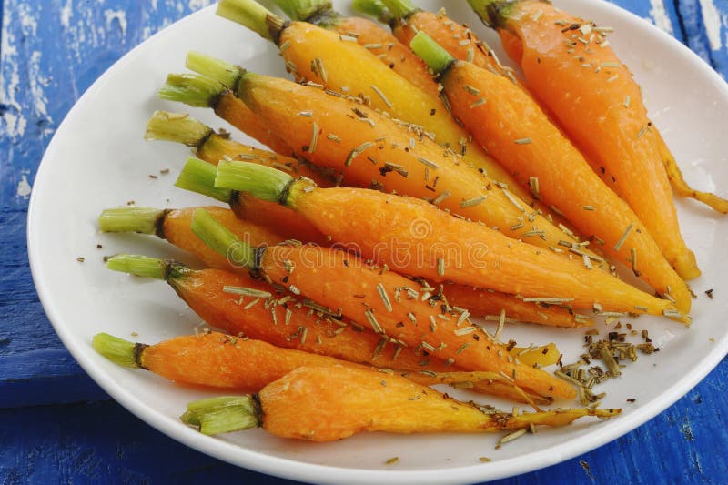 Baked baby carrot stock image. Image of baby, rosemary 44497593