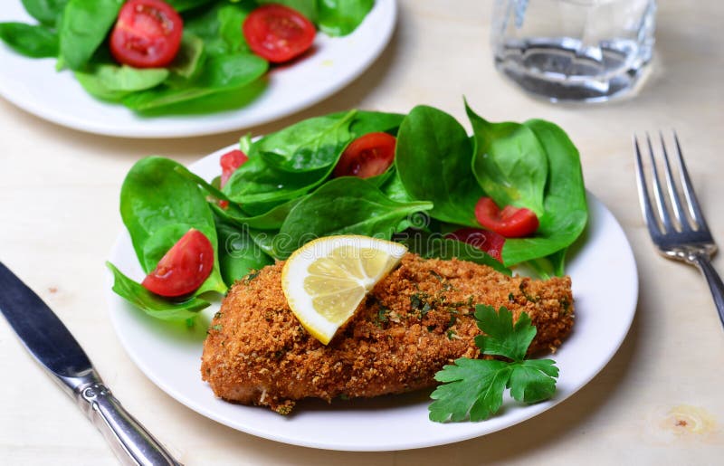 Baked in Bread Crumbs Chicken Fillet with Salad Stock Image Image of