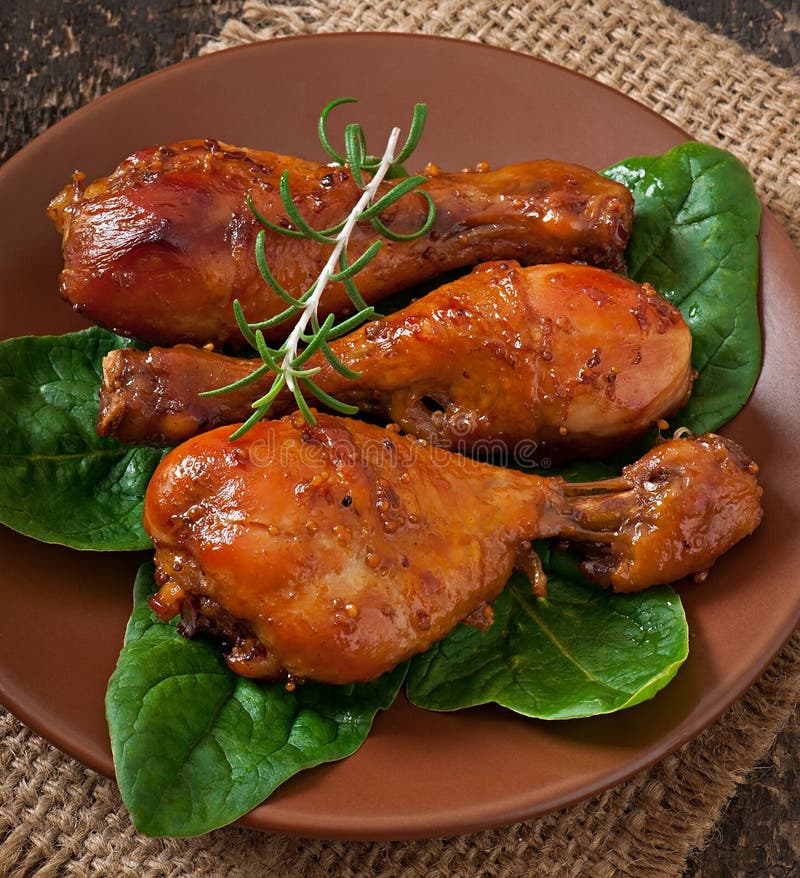 Baked Chicken Legs with Sliced Potatoes and Herbs. Barbecue Chicken