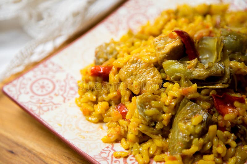 Baked Chicken Rice Paella with Vegetables. Traditional Spanish Recipe