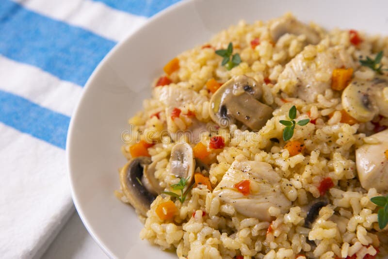 Baked Chicken Rice Paella with Vegetables. Traditional Spanish Recipe