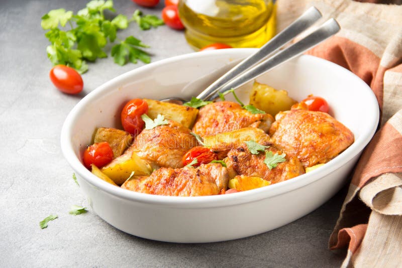 Baked Chicken Thighs (legs) with Crispy Crust, Potatoes and Cherry