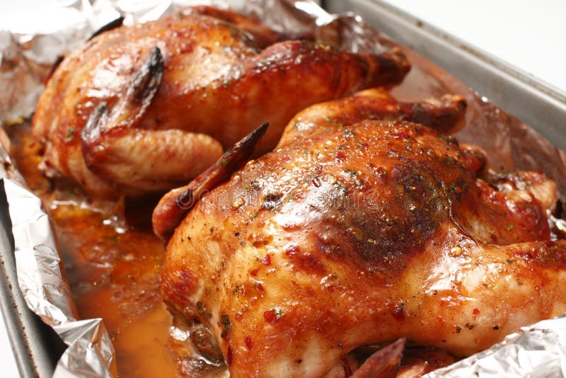 Baked chickens stock image. Image of foil, cook, gourmet 12277685