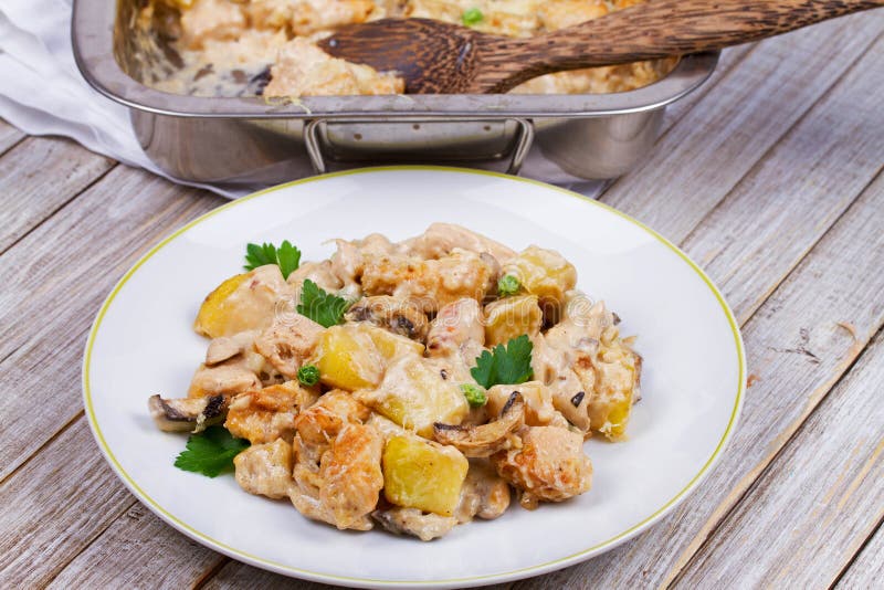 Baked Creamy Chicken, Potato and Mushrooms. Stock Photo - Image of ...