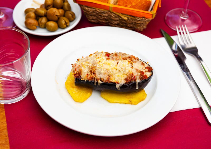 Baked eggplant stuffed with meat and bechamel sauce - spanish dish