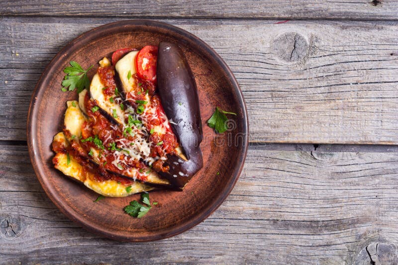 Baked eggplant with tomato stock photo. Image of italian 98398280
