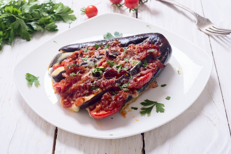 Baked eggplant with tomato stock image. Image of delicious 98398669