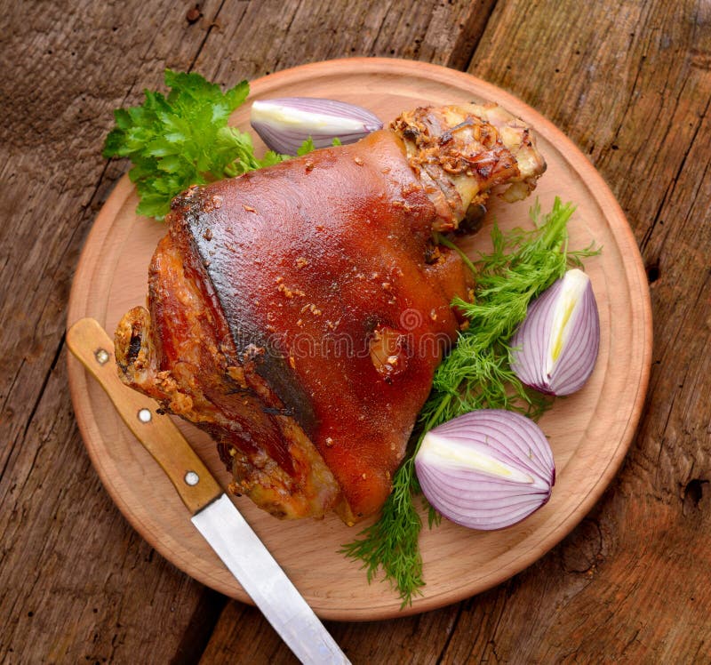 Raw Eisbein or ham hock, or Schweinshaxe.