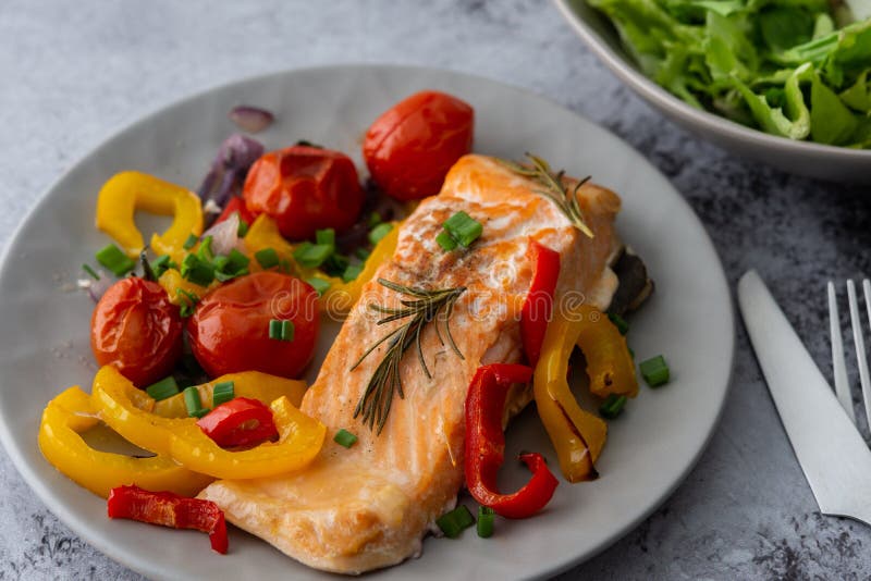Baked Fillet Arctic Char on a Plate with Vegetables Stock Photo - Image ...