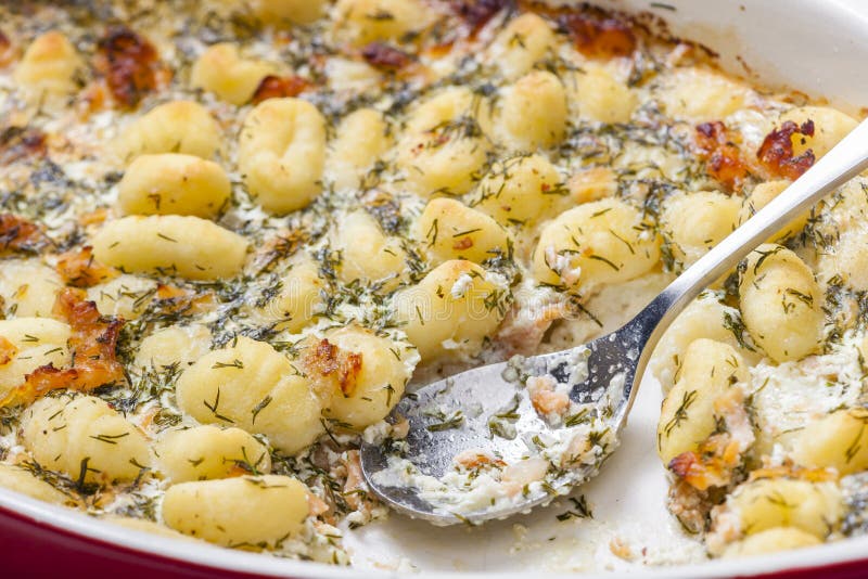 Baked Gnocchi with Salmon and Dill Sauce Stock Photo - Image of gnocchi ...