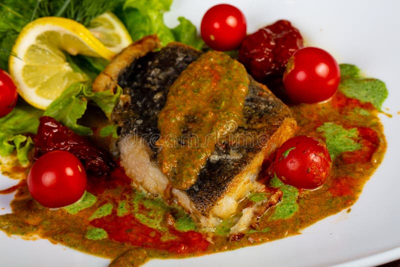 Baked halibut fish fillet stock photo. Image of nutrition 129350486