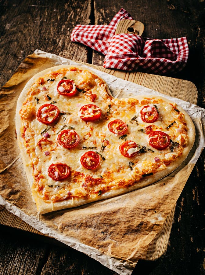 Baked Heart-shaped Pizza Topped With Tomato Slices Stock Image - Image of herbs, heart: 58106865