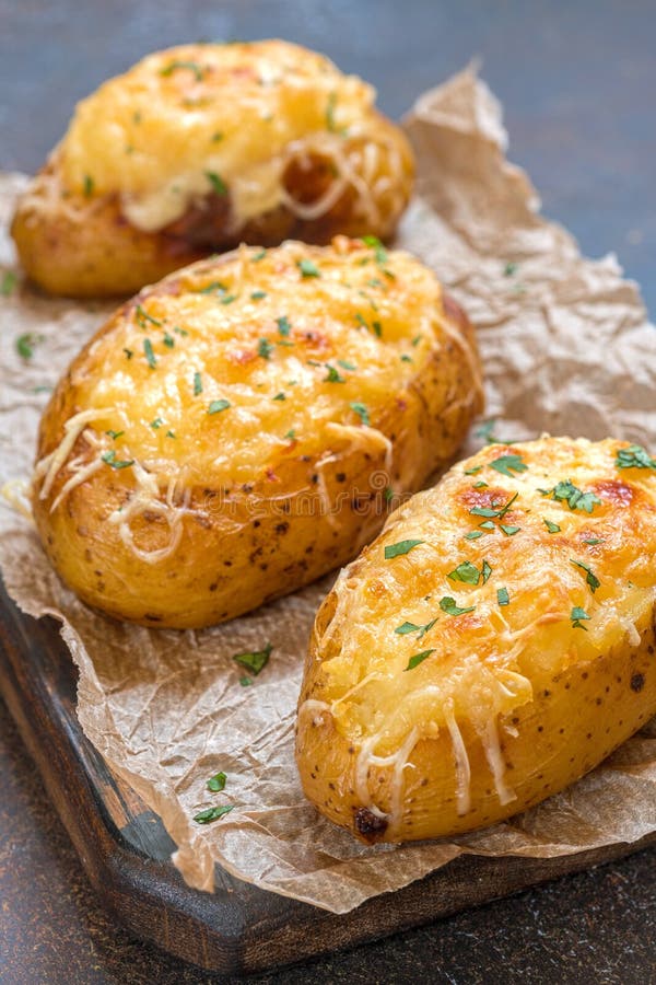 Baked Loaded Potato with Bacon, Cheese and Onion Stock Photo - Image of
