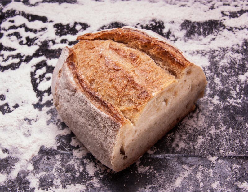 Baked Loaf on Black Baking Tray. Country House Style Stock Image