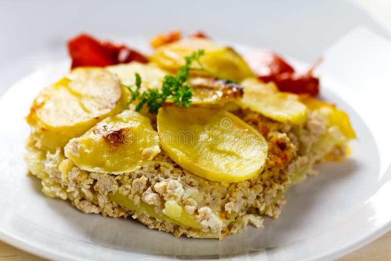 Baked moussaka dish on a wooden board royalty free stock images Baked moussaka dish on a wooden board royalty free stock images