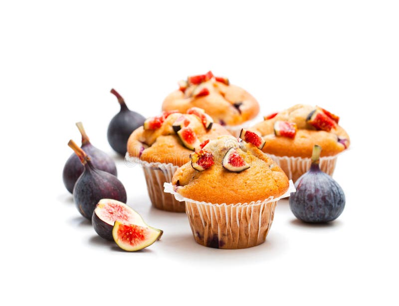 Baked muffins with figs isolated on white