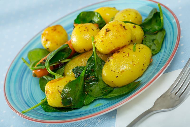 Baked New Potatoes with Spinach Stock Photo - Image of foodstuff