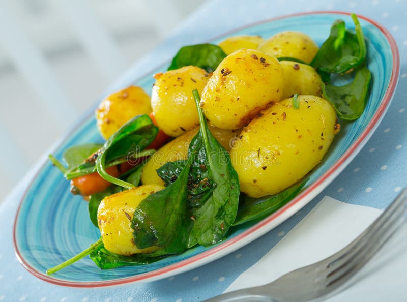 Baked New Potatoes with Spinach Stock Photo - Image of healthy, potato