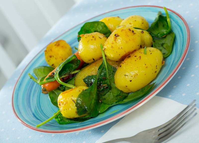 Baked New Potatoes with Spinach Stock Image - Image of cooked, spicy