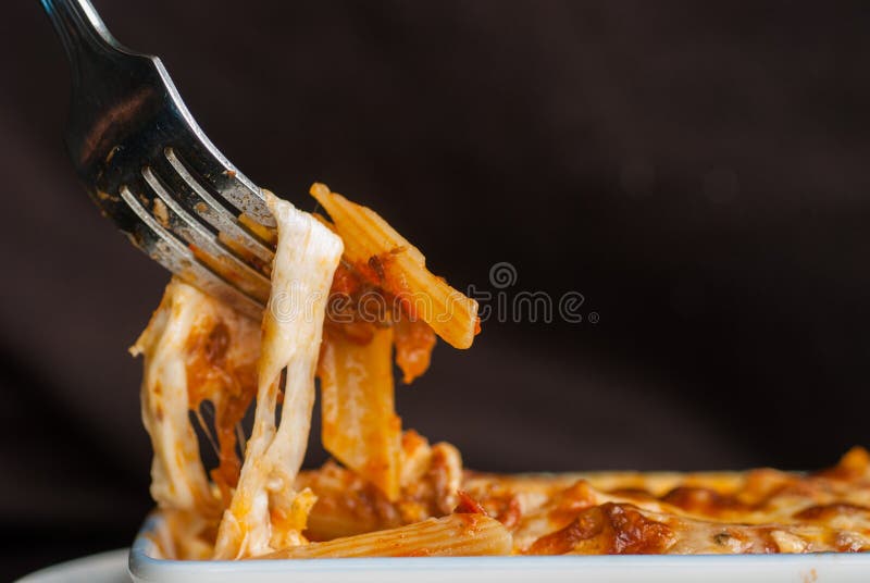 Baked Penne Pasta with Tomato Sauce and Cheese Stock Photo - Image of