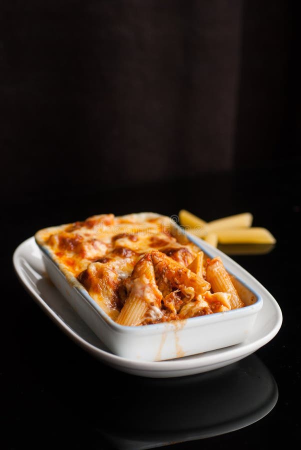 Baked Penne Pasta with Tomato Sauce and Cheese Stock Photo - Image of ...