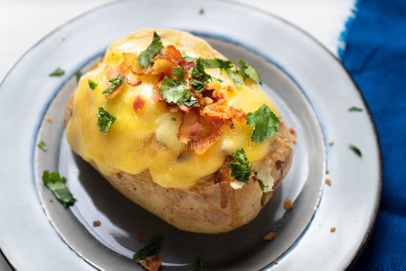 Baked Potato with Bacon and Cheese Stock Photo - Image of gourmet