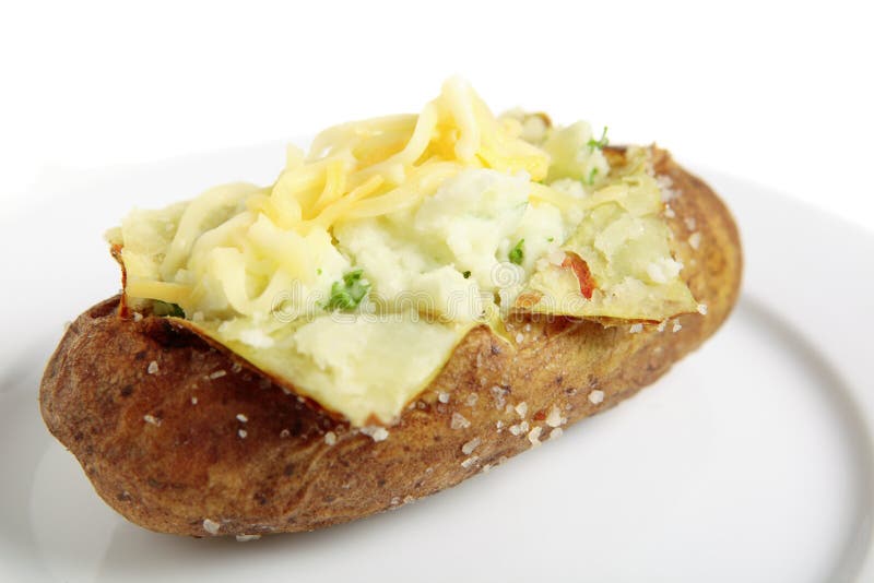 Baked potato with cheese stock image. Image of plate - 19595761
