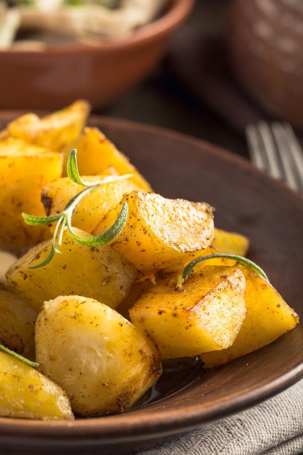 Baked Potato with Rosemary on Plate Vertical Stock Photo Image of
