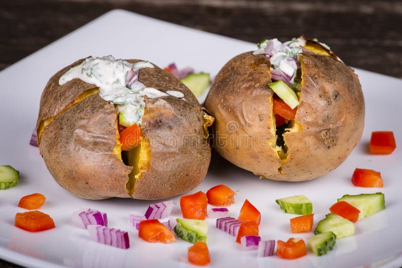Baked Potato with Vegetables and Sour Cream. Stock Photo Image of