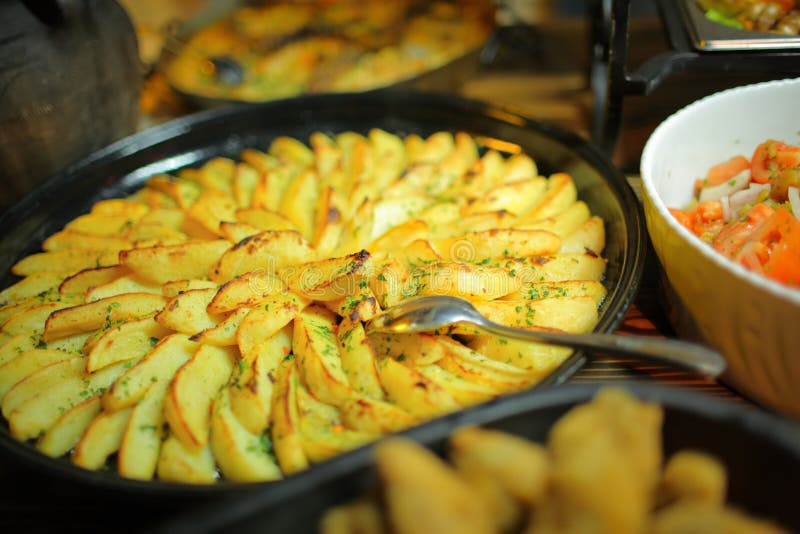 Baked potatoes served in a restaurant. Crispy diet stock images, royalty-free photos and pictures