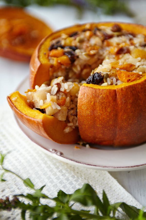 Baked Pumpkin with Rice and Fruits Stuffing stock photography
