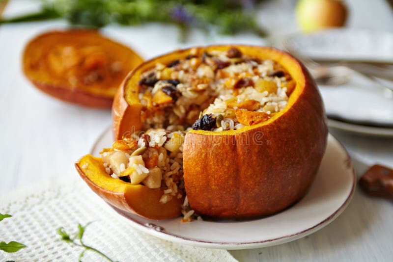 Baked Pumpkin with Rice and Fruits Stuffing royalty free stock photo