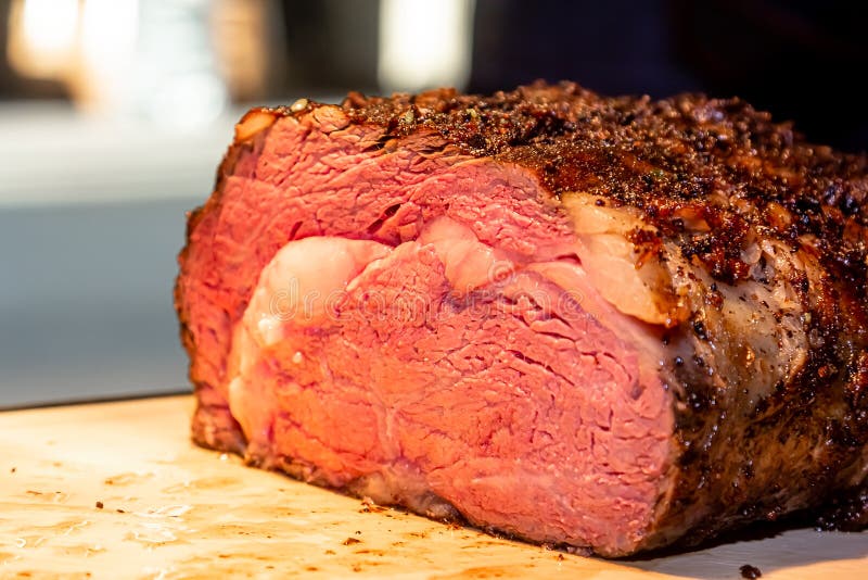 Baked Roast Beef from Rib Eye of Marbled Beef Lies on the Board Stock